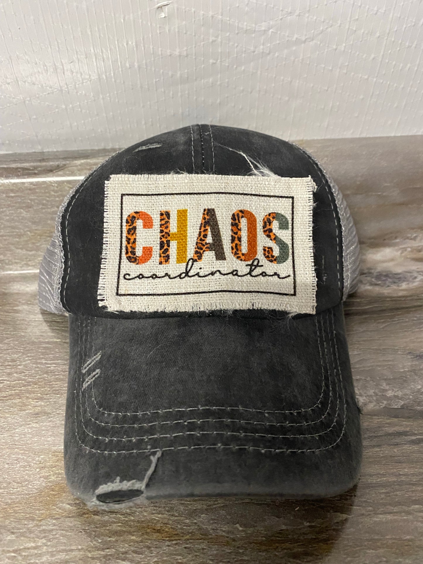 Chaos Coordinator with leopard multi colored Hat Patch