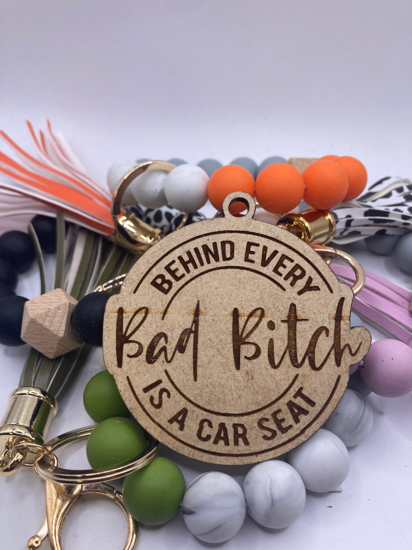 Behind Every Bad Bitch is a Car Seat Round Accessory Token